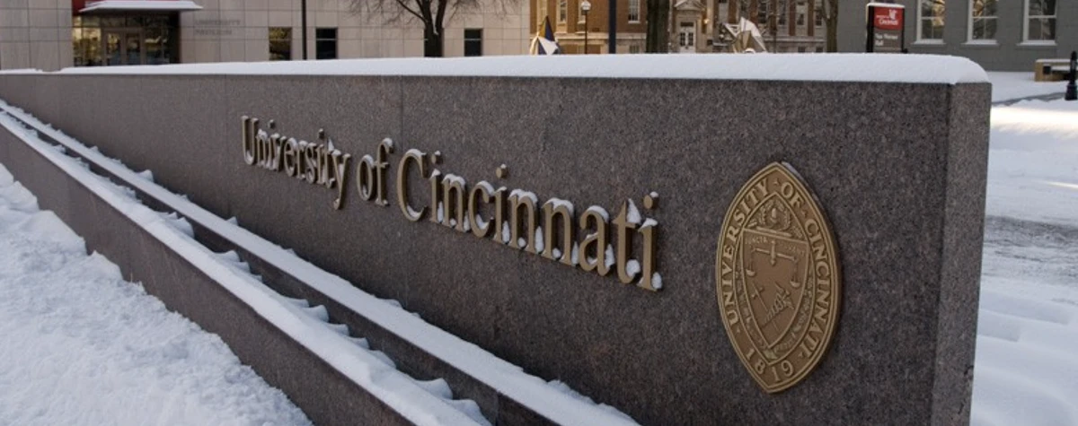 UC sign with snow on it